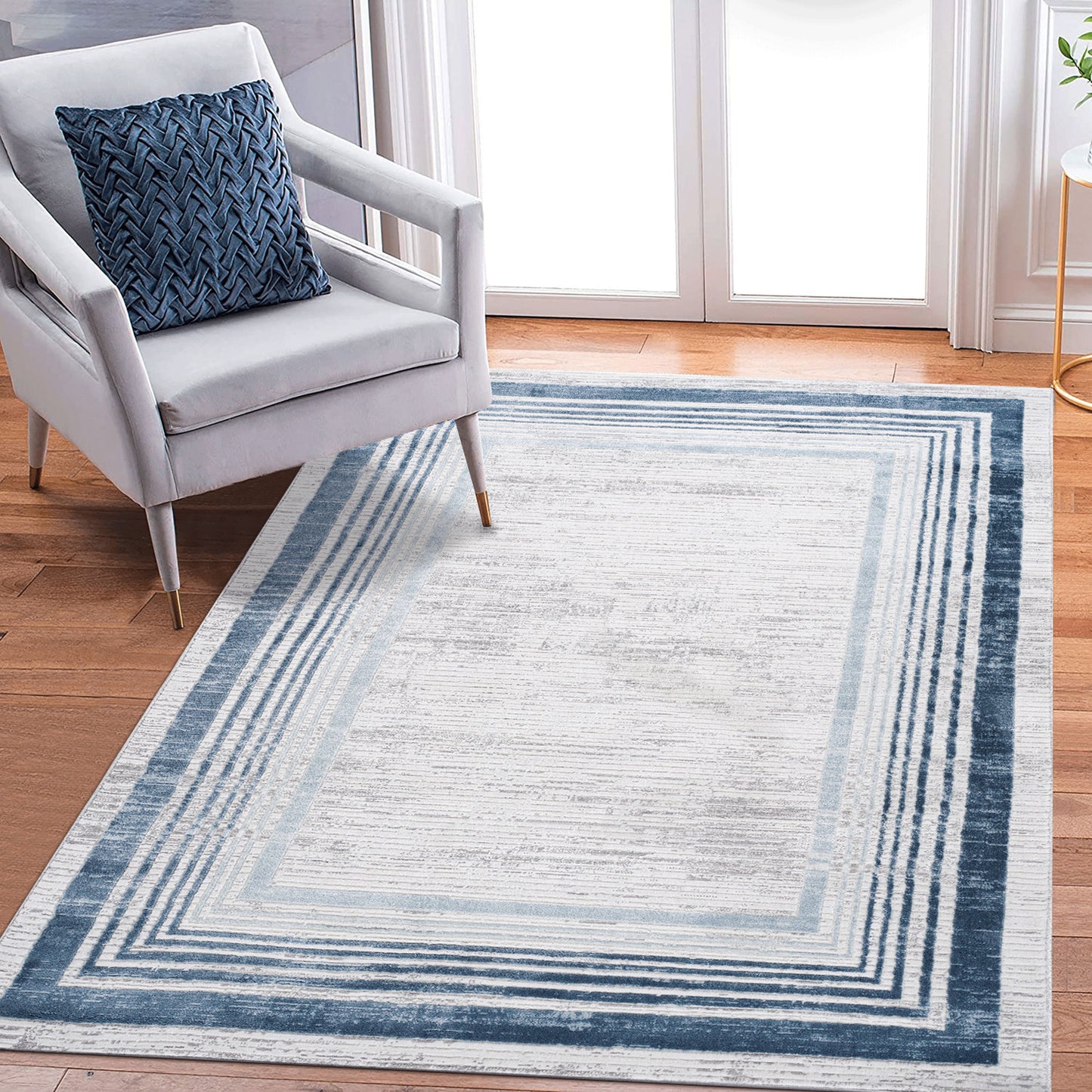 5' x 7' Bordered Non-Shedding Living Room Bedroom Dining Home Office Stylish And Stain Resistant Area Rug - Blue / Ivory